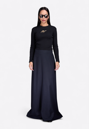 Model wearing long cotton skirt, front view – East Vibe